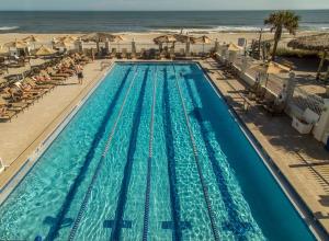 an overhead view of a swimming pool at the beach at Ponte Vedra Inn and Club in Ponte Vedra Beach