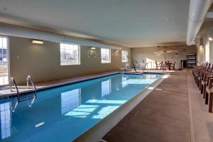 The swimming pool at or near Cobblestone Hotel & Suites - Newton