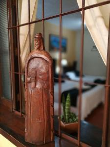 Postel nebo postele na pokoji v ubytování Posada Doña Luisa