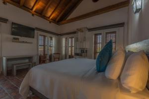 TV a/nebo společenská místnost v ubytování Getsemani Cartagena Hotel
