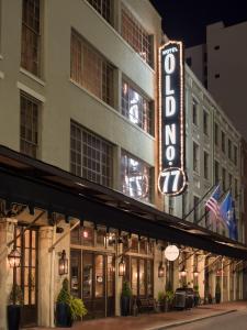 a hotel sign on the side of a building at The Old No. 77 Hotel & Chandlery in New Orleans