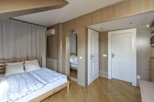 Posteľ alebo postele v izbe v ubytovaní Panoramic Loft