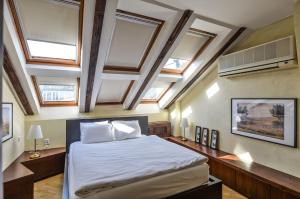 Posteľ alebo postele v izbe v ubytovaní Panoramic Loft