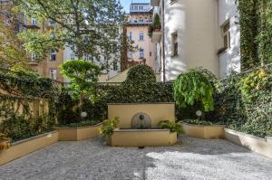 Vonkajšia záhrada v ubytovaní Panoramic Loft