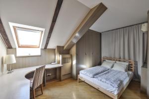 Posteľ alebo postele v izbe v ubytovaní Panoramic Loft