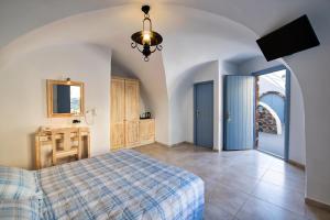 En eller flere senger på et rom på Anatoli Hotel & Spa