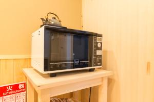 Kuchyň nebo kuchyňský kout v ubytování Miro Shijo Saiin Tei