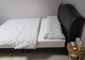 Postel nebo postele na pokoji v ubytování K Guesthouse
