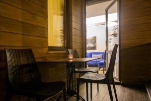 Posezení v ubytování Maxuite Hotel in Home