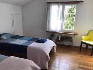 Postel nebo postele na pokoji v ubytování Bed n Breakfast Obermumpf