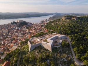 an aerial view of a building on top of a hill at Apartments Govic in Zaboric