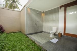 Vannituba majutusasutuses Parthi Puri Ubud