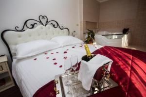 Postel nebo postele na pokoji v ubytování Guest House Šterk