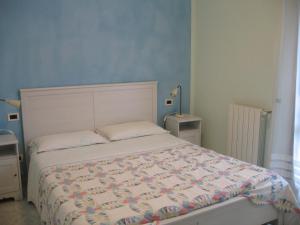 Ένα ή περισσότερα κρεβάτια σε δωμάτιο στο Il Boschetto