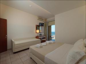 Postel nebo postele na pokoji v ubytování Hotel Florence