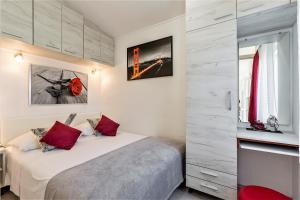 Postel nebo postele na pokoji v ubytování Apartment Taja, cijela kuća i vrt samo za vas