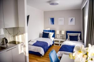 Postel nebo postele na pokoji v ubytování Hotel Coliber + 37 fotografií