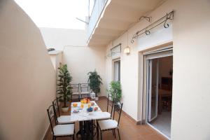 a dining room with a table and chairs in a building at El Repòs del Montsec in Balaguer