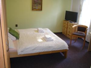 Posteľ alebo postele v izbe v ubytovaní Hotel Garni Belveder