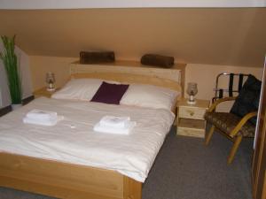Posteľ alebo postele v izbe v ubytovaní Hotel Garni Belveder