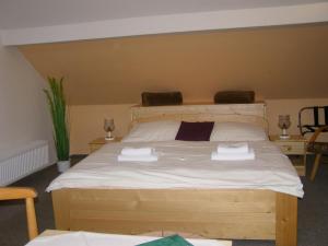 Posteľ alebo postele v izbe v ubytovaní Hotel Garni Belveder