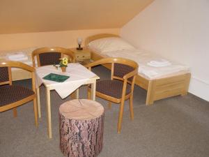 Posteľ alebo postele v izbe v ubytovaní Hotel Garni Belveder
