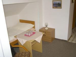 Posteľ alebo postele v izbe v ubytovaní Hotel Garni Belveder