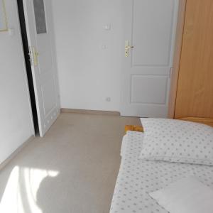 Postel nebo postele na pokoji v ubytování Biesiadny Dworek