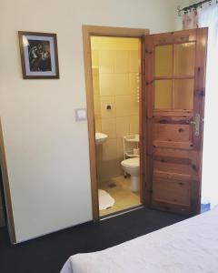 Kúpeľňa v ubytovaní Willa Łojasówka