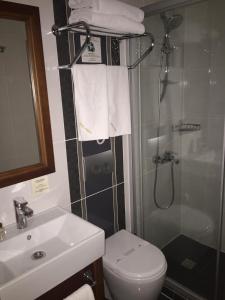 Um banheiro em Hotel Perula & SPA