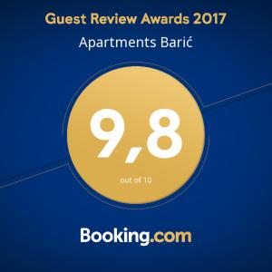 a yellow circle with the words guest review awards applicants bank at Apartments Barić in Trogir