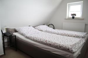 Katil atau katil-katil dalam bilik di Rantum-1-Wohnung-Ebbe