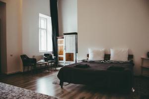 Postel nebo postele na pokoji v ubytování Mansion Josephina
