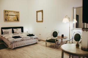 Postel nebo postele na pokoji v ubytování Mansion Josephina