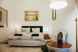 Postel nebo postele na pokoji v ubytování Mansion Josephina