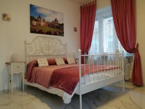 A bed or beds in a room at B&B Casa Nizza