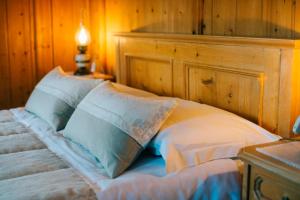 Llit o llits en una habitació de Albergo Pa' Krhaizar