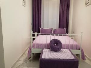 A bed or beds in a room at B&B Casa Nizza