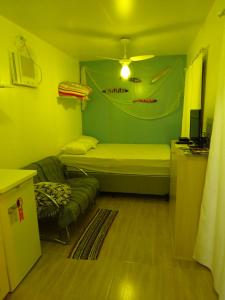 Postel nebo postele na pokoji v ubytování Ekontainer Hospedaria Praia Do Rosa