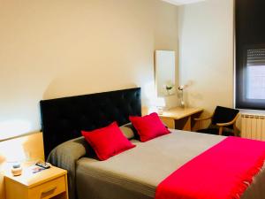 Cama o camas de una habitación en Hotel Viñas 17