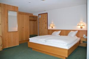 En eller flere senger på et rom på Hotel Seeblick