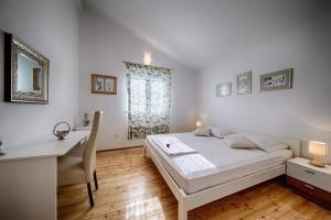 Posteľ alebo postele v izbe v ubytovaní Seaview Suite Lissa
