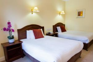 Voodi või voodid majutusasutuse Oranmore Lodge Hotel Conference And Leisure Centre Galway toas
