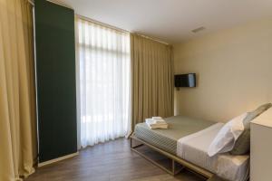 Postel nebo postele na pokoji v ubytování In Dies Affittacamere