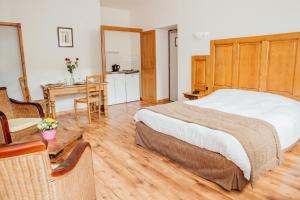 Postel nebo postele na pokoji v ubytování Appart Hotel Charles Sander