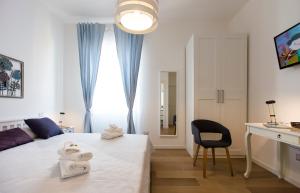 Postel nebo postele na pokoji v ubytování Jolie Julie Accomodation