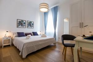 Postel nebo postele na pokoji v ubytování Jolie Julie Accomodation