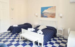 Кровать или кровати в номере Alta Marea B&B
