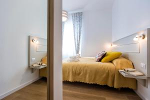 Postel nebo postele na pokoji v ubytování Jolie Julie Accomodation