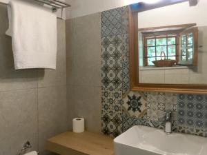 Koupelna v ubytování Saxonis Houses & Saxonis Villa